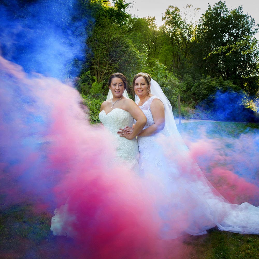 smokebombs enguf the brides at Gleddoch House Wedding