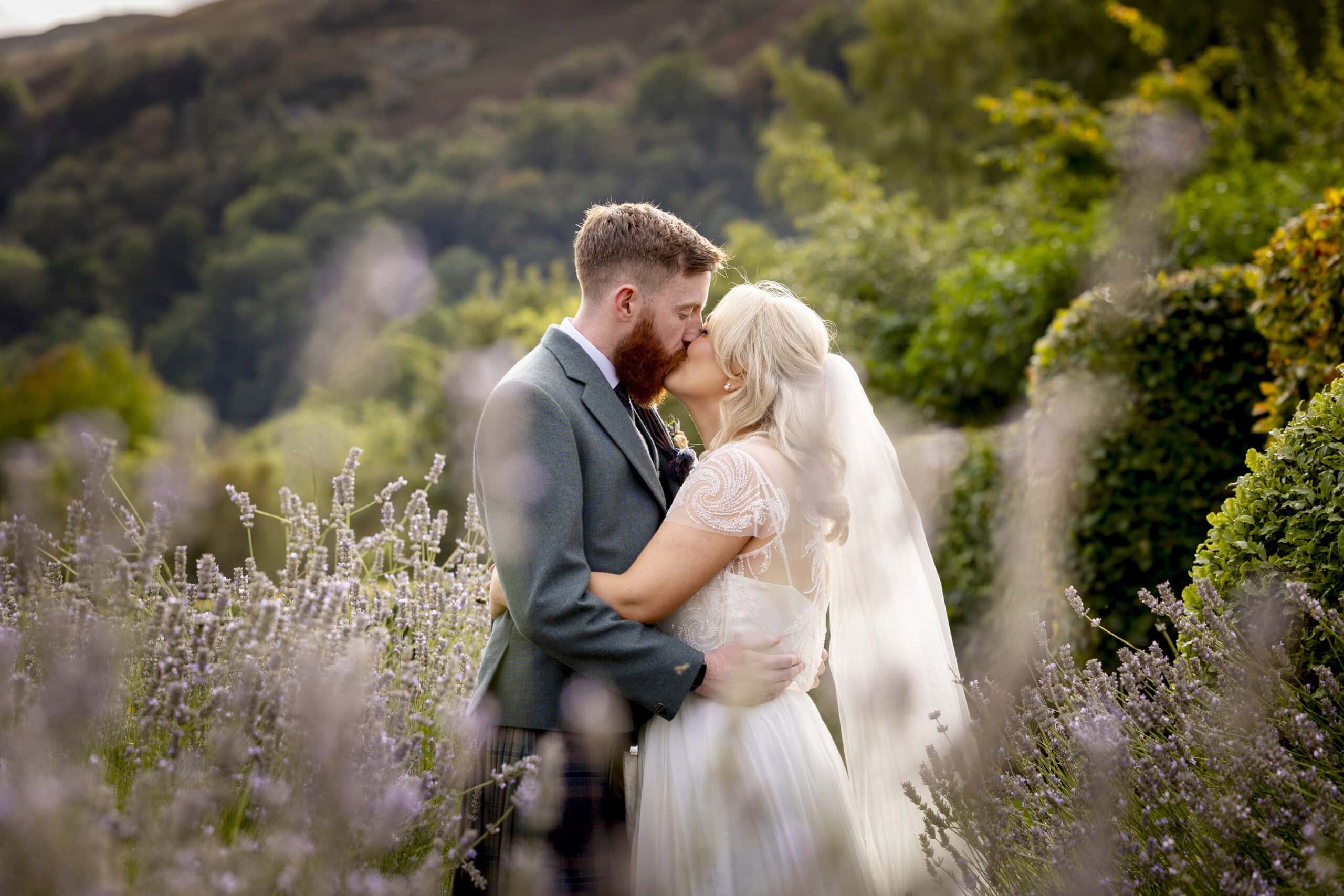 a romantic moment from a wedding at the Loch Lomond Arms