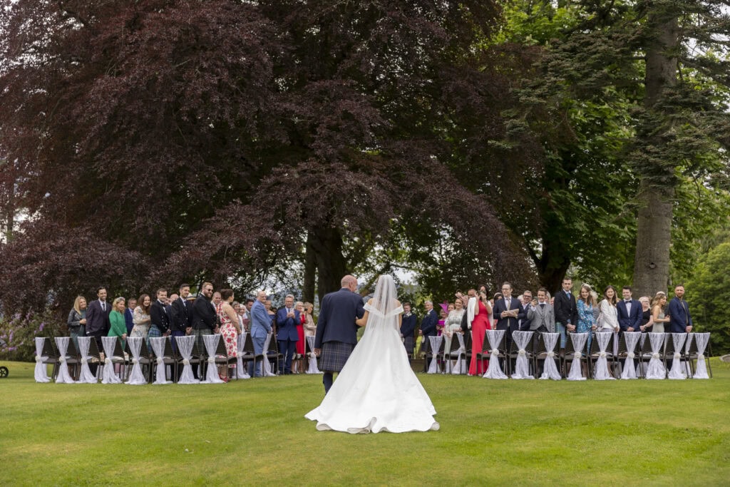 Bride walks down the aisle at Altskeith House Wedding