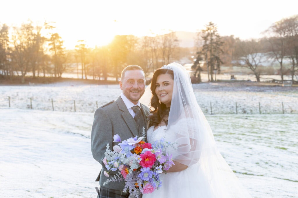 Bride and Groom enjoy a winter sunset at Cornhill Castle