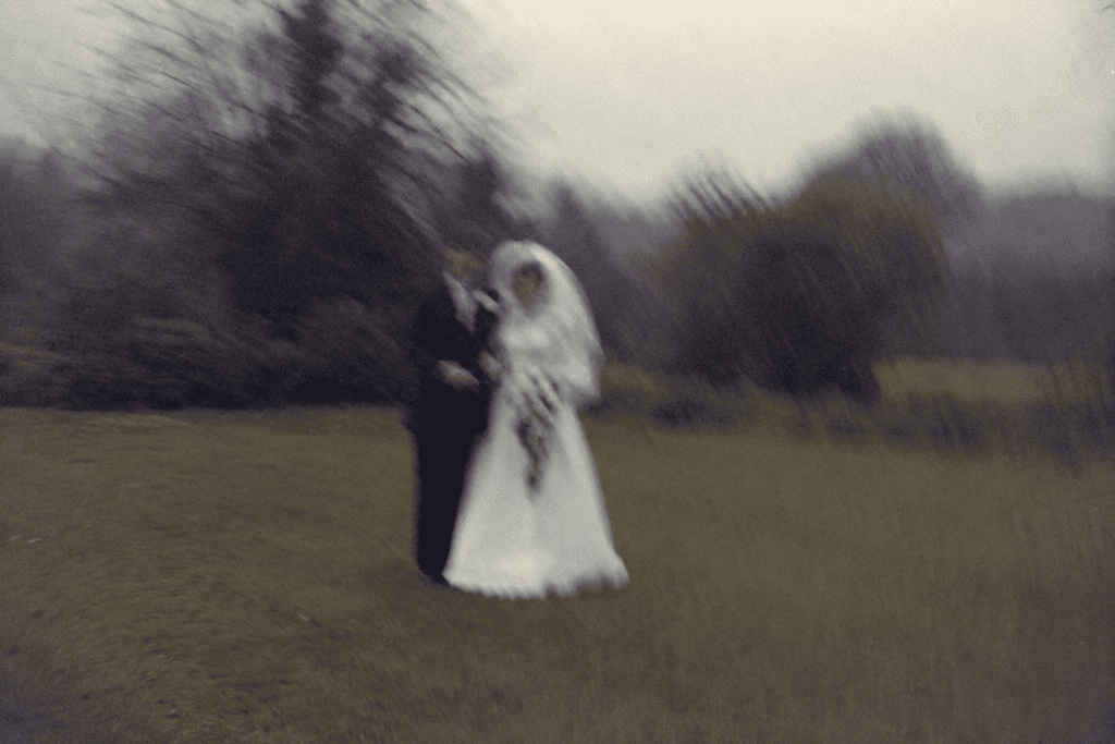 AI-generated parody of a blurred and grainy 1980s film wedding photograph.